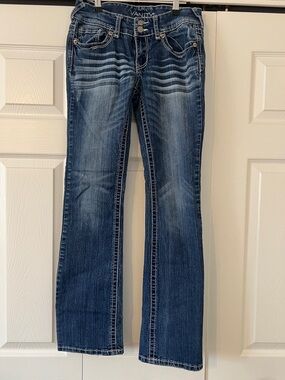 Vanity Mid Wash Flare Jeans in Dark Blue with Fading